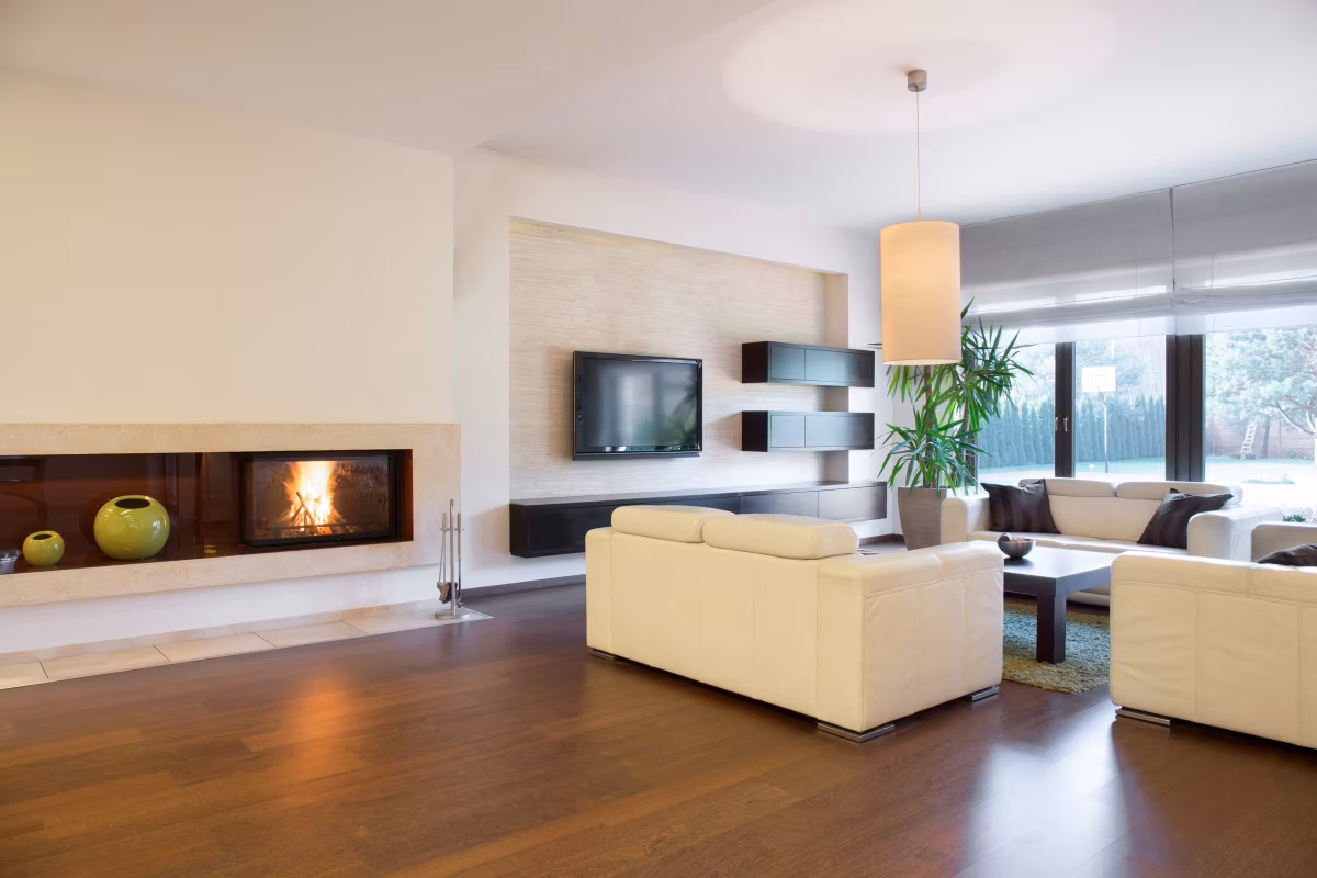 spacious cozy living room with lighted fireplace