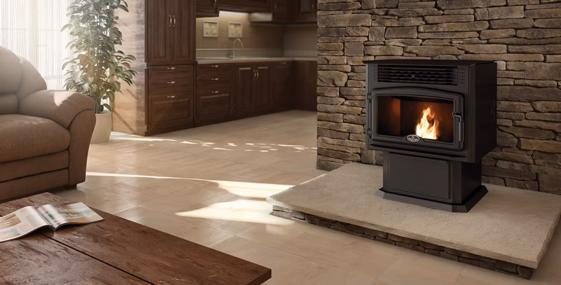 black pellet stove on stone hearth in warm kitchen