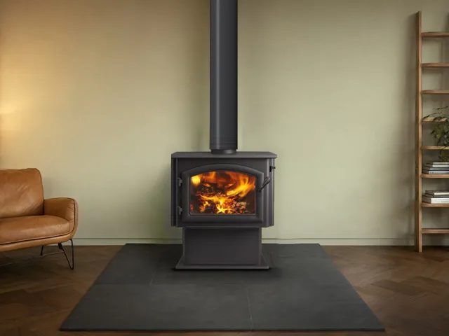 Forge & Flame Millennium 3100 wood stove with Quadra-Fire technology in a farmhouse living room